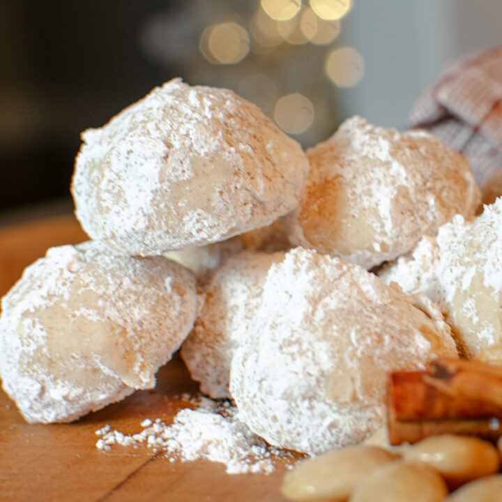 Cinnamon Spice Snowball Cookies with Marcona Almonds and cinnamon sticks