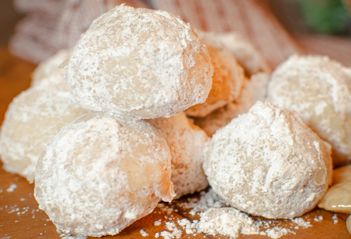 Cinnamon Spice Snowball Cookies with Marcona Almonds and cinnamon sticks