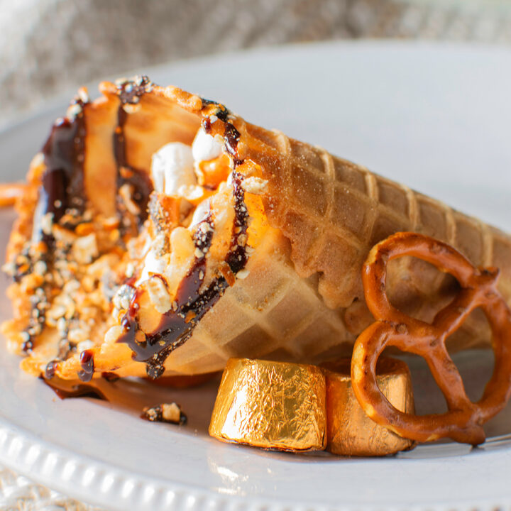 Hershey's Loaded Smores in a Cone. Pretzels, rolo caramels, marshmallows, and crushed graham cracker for campfire in a cone vibes