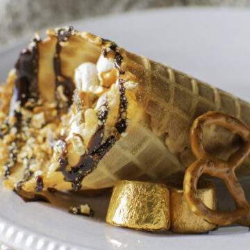 Hershey's Loaded Smores in a Cone. Pretzels, rolo caramels, marshmallows, and crushed graham cracker for campfire in a cone vibes