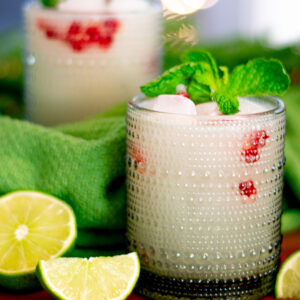 white Christmas coconut lime mint mojito with pomegranate