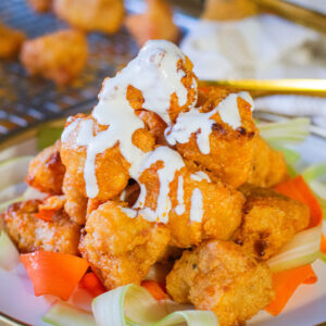 Air Fryer Buffalo Cauliflower with Blue Cheese Drizzle for Super Bowl or Game Day Snacking