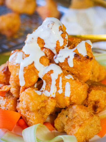 Air Fryer Buffalo Cauliflower with Blue Cheese Drizzle for Super Bowl or Game Day Snacking