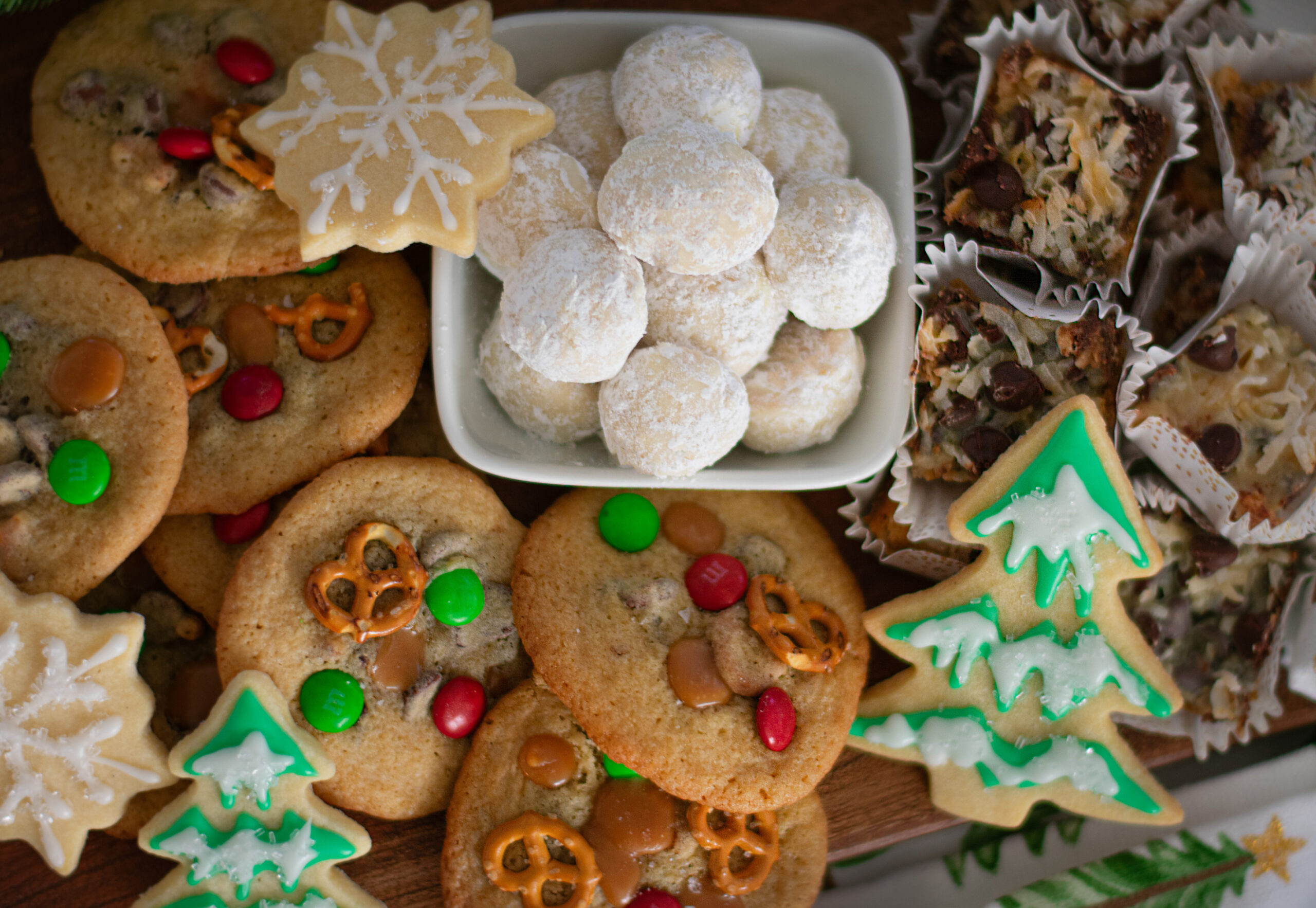 M&M Kitchen Sink Cookies, Snowball Cookies, Sugar Cookies, and Magic Cookie Bars