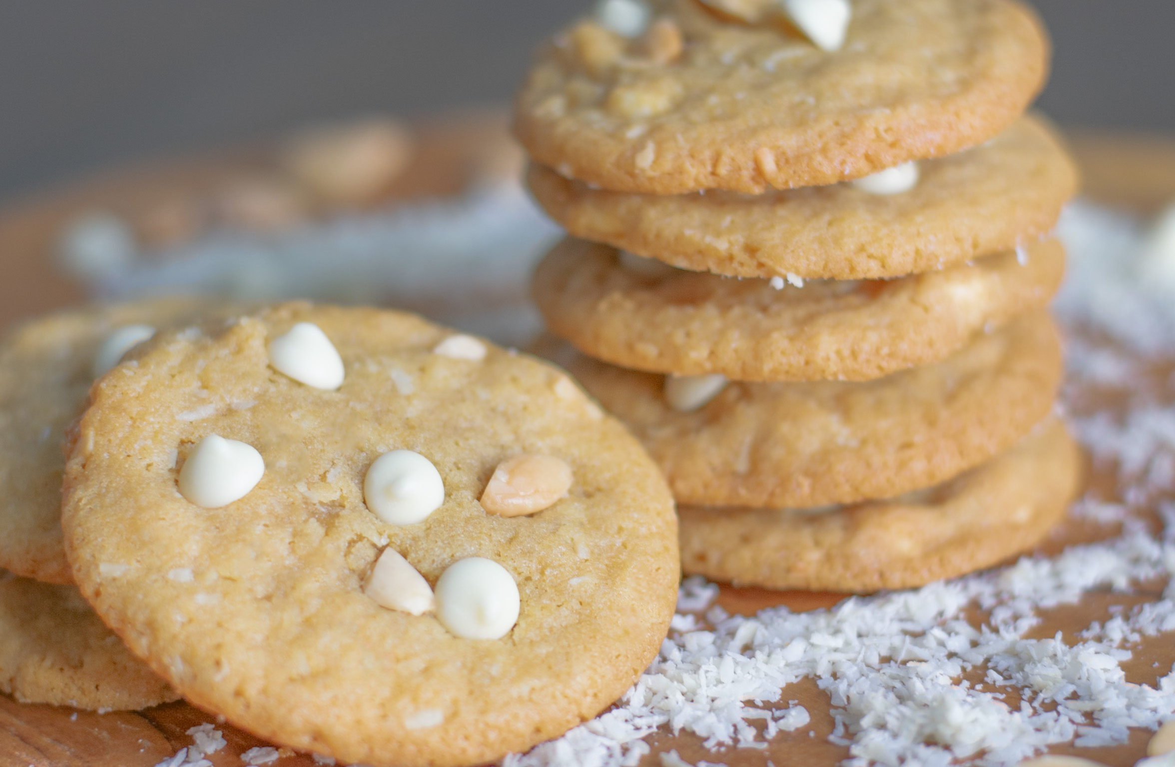 Tropical coconut cookies with shredded coconut, white chocolate, and Marcona almonds, perfect for Easter dessert tables.