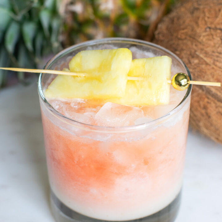 Guava Sunrise Colada Recipe layered with guava, pineapple, and coconut for a tropical Piña Colada twist