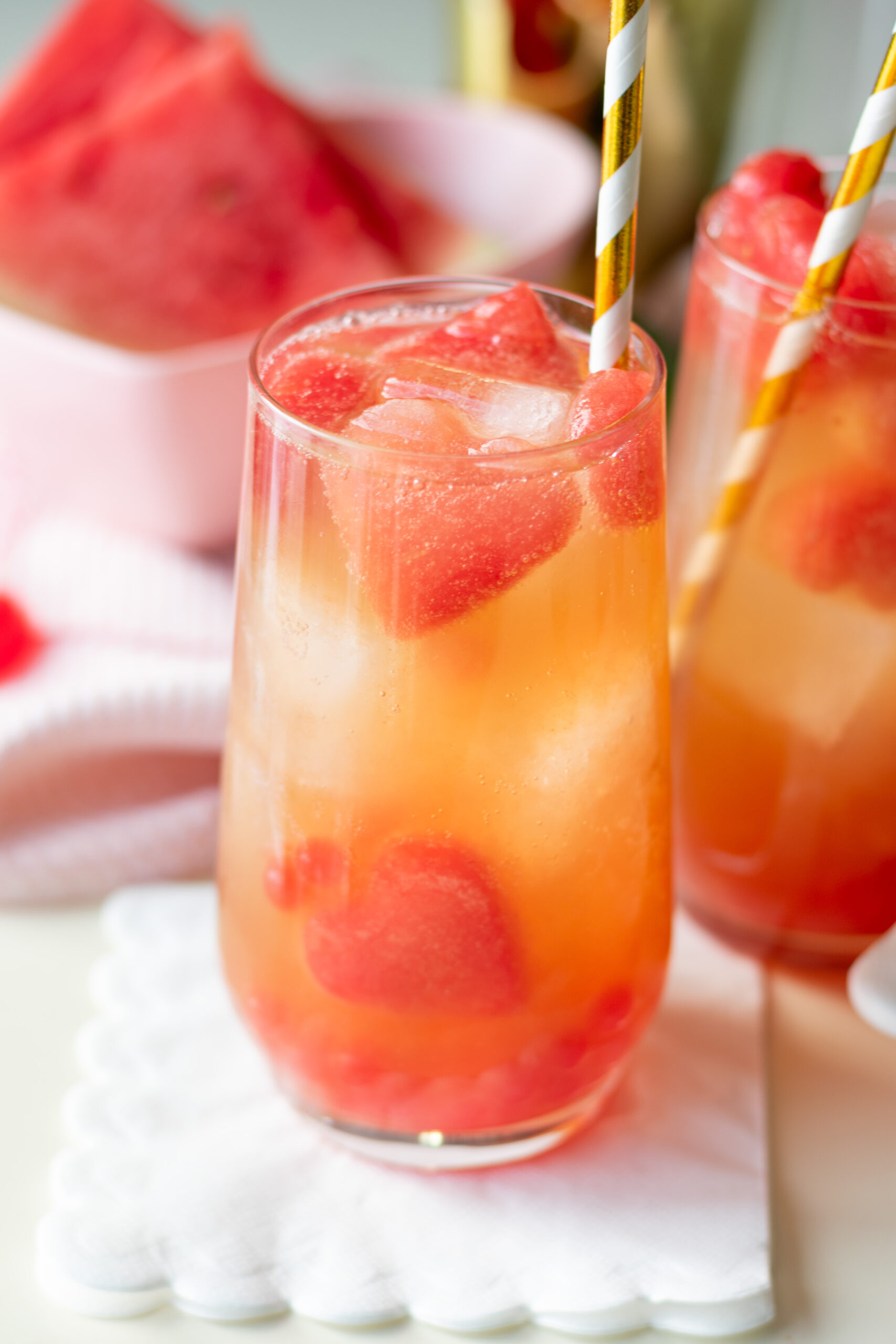 Pink popping boba drink recipe with watermelon heart ice cubes and bubbles