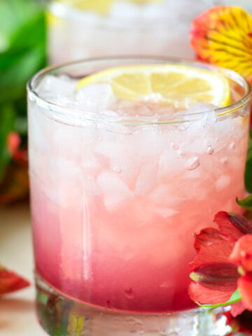 azalea drink recipe mocktail with pomegranate and lemon over crushed ice
