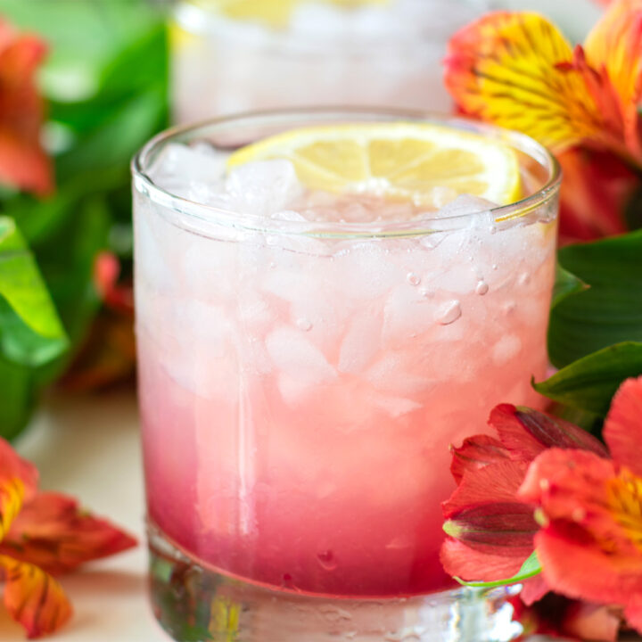 azalea drink recipe mocktail with pomegranate and lemon over crushed ice